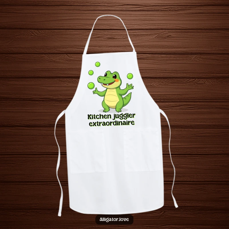 Funny alligator apron showing a cheerful reptile juggling green balls, ideal for kitchen fun and protection.