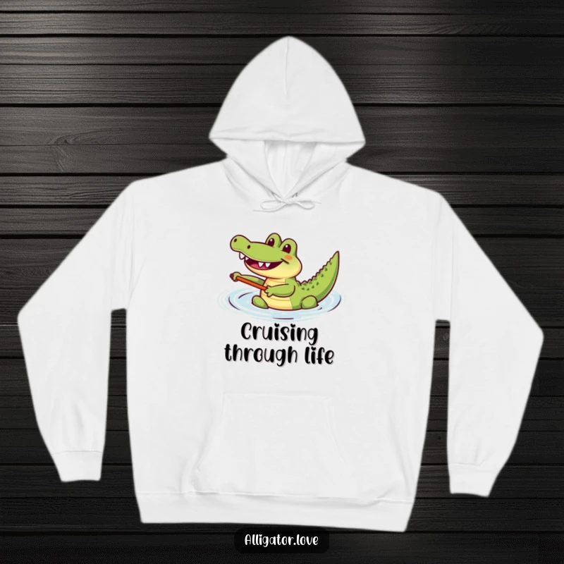 Funny joyful alligator happily paddling in the water, a cozy and humorous hoodie.